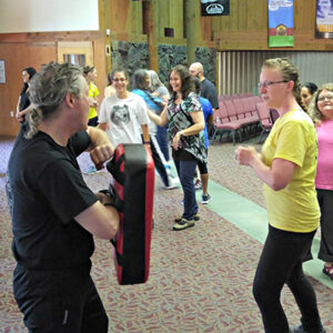 Martial arts teacher with students.